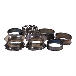 Group of silver, comprising 1930s silver five bar toast rack, 1940s silver sauce boat, three pairs of napkin rings and a single pierced foliate napkin ring, all with vacant cartouches, all hallmarked 