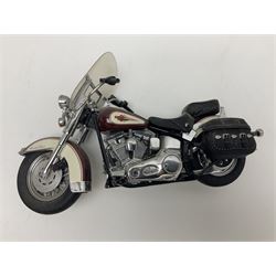 Franklin Mint - three die-cast models comprising 1:10 scale Harley Davidson Heritage Softail motorcycle, 1:24 scale 1957 VW Beetle and 1:24 scale 1993 Rolls Royce Corniche IV; all unboxed (3)