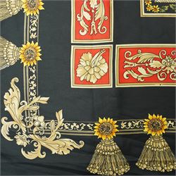 Hermès silk carré scarf, the black ground with central sunflower motif framed by ornate baroque panels and tassel borders in red, gold and yellow tones, signed Hermès Paris to the corner, hand-rolled edges, 90cm x 90cm