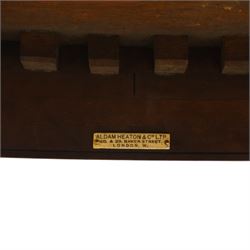 Aldam Heaton & Co (fl.1878-97) - late 19th century Sheraton revival style satinwood inlaid oval centre table, raised inlaid edge, centre with finely executed large central  inlaid medallion, surrounded by ribbon tied swags interspaced with medallions, frieze with rectangular symmetrical panels of foliate sprays of acanthus leaves, raised on four square section tapering legs with cavetti shaped shoulders with stringing on brass bulb feet, underside with bone plaque signed Aldam Heaton & Co, Baker St, London