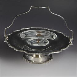 1920s silver swing handled pedestal dish, of octagonal form with shaped rim and foliate border, upon a similar pedestal, hallmarked Cooper Brothers & Sons Ltd, Sheffield 1922, not including handle H7cm