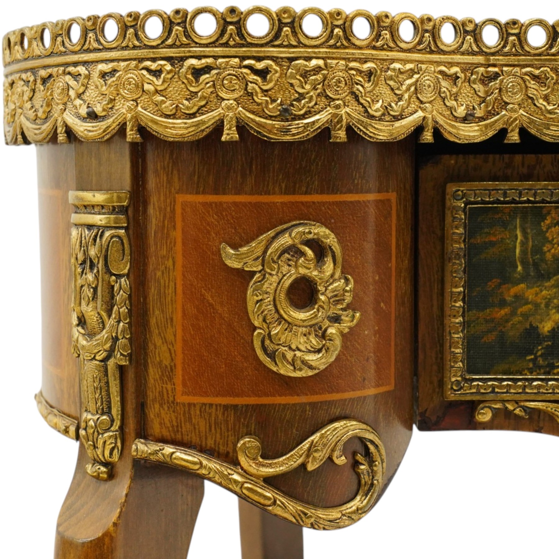 French Louis XV design inlaid kidney-shaped occasional table, the shaped pink marble top with pierced and raised gilt metal gallery edge of egg-and-dart design with swags, fitted with central drawer with a pastoral scene to facia, flanked by gilt metal mounts, raised on cabriole supports united by shaped undertier 