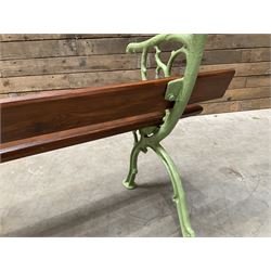 Cast iron and wood slate bench painted in green