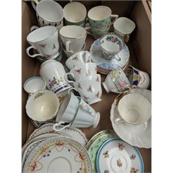 Pair of foo dogs, enamel pans and a collection of teacups, saucers and other ceramics