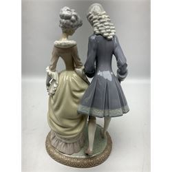 Lladro figure, Walk in Versailles, modelled as a man and woman in period dress, sculpted by Vincente Martinez, no 5004, year issued 1978, year retired 1981, H40cm 