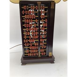 Vintage Chinese abacus table lamp, with double light fitting, and cream fabric shade decorated with characters, overall H73cm