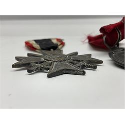 WW2 German Eastern Front Medal awarded to those who served on the German Eastern/Russian Front during the Winter Campaign period of 15th November 1941 to 15th April 1942 with original ribbon; German War Merit Cross with swords; and NSDAP Long Service Award (3)