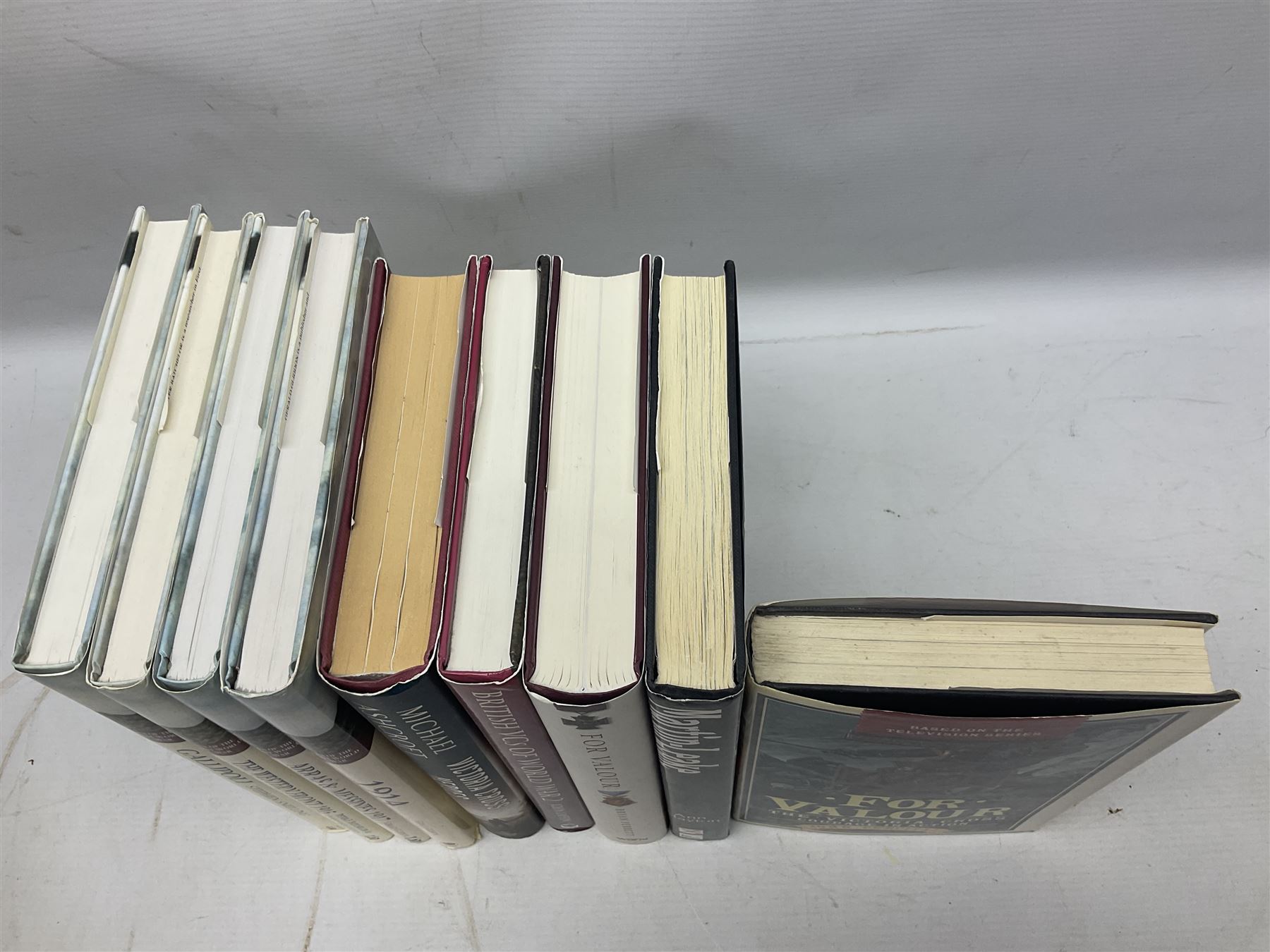 Nine reference books of Victoria Cross interest including four 'VCs of the First World War' series; Martin Ashcroft: Victoria Cross Heroes; John Laffin: British VCs of World War Two; Bryan Perrett: For Valour; Ann Clayton: Martin Leake Double VC; and John Percival: For Valour (9)