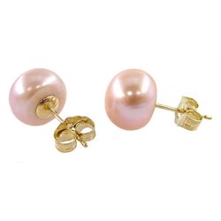 Pair of 9ct gold pink / peach pearl stud earrings, stamped 375
