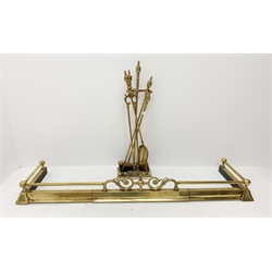  Early 20th century brass companion set with stand, H77cm and a matching brass telescopic fire fender with ornate gallery, L148cm x D36cm (unextended)   