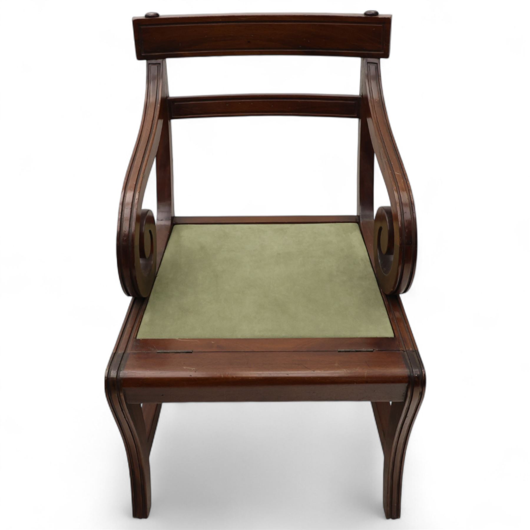 In the manner of Morgan & Sanders - early 20th century Regency design mahogany metaphoric library chair and steps, rectangular panelled top-rail with applied roundels with scrolling arms and upholstered seat and cushion, hinged and folding design transforming into four carpeted steps

Reference: The present lot is based on a design for a metamorphic library chair published by Morgan & Saunders circa 1810, P.Agius, Ackermann's Regency Furniture & Interiors, plate 29, page 60