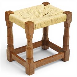 Mouseman - mid-20th century oak stool, the rectangular rush seat raised on turned octagona...