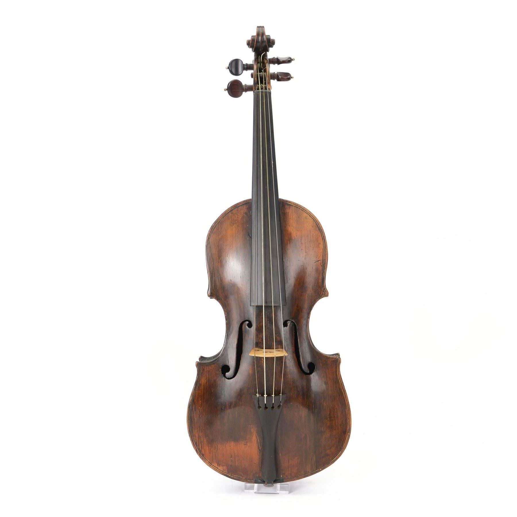 Early Violin - possibly German 17th century with a solid wood body, later neck and fingerboard. In a soft case with bow.