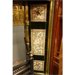  Large Edwardian mahogany fireplace, projecting dentil cornice, panelled frieze inlaid with birds, floral urns and scrolling interlaced foliage, moulded aperture, tapered and sloped pilastered with inlays, scrolled and ball carved capitals, stepped moulded plinth, inset with brass moulded and bead surround, tiled uprights, frieze decorated with urn and flowers, geometric border, cast iron fire front, rectangular slate hearth, W183cm, H135cm (max)  