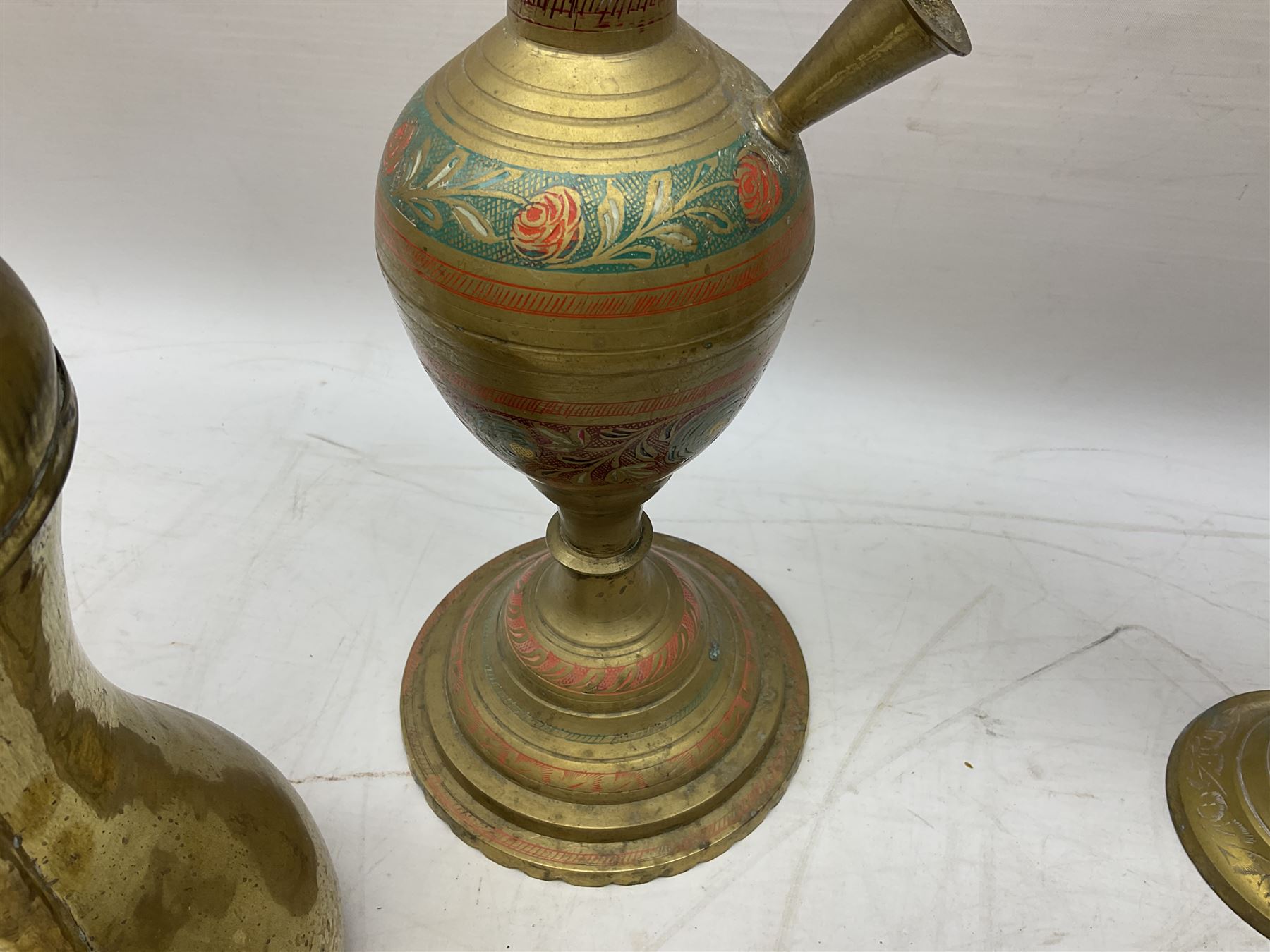 Two brass hookah pipes, and quantity of brass Arabic Dallah coffee pots and other brassware