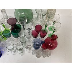 Collection of glassware, to include large green glass bottle, coloured drinking glasses, 18th century style drinking glasses, etc 