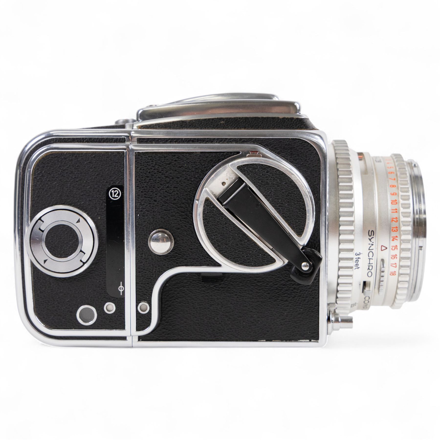 Hasselblad 500C medium format camera, serial no. TC60836, circa 1965, with Carl Zeiss Planar 1:2.8 f=80mm lens with cap, serial no. 4199654, one film back, serial no. TC87300 and a Hasselblad PM5 prism viewfinder serial no. 401EE1335