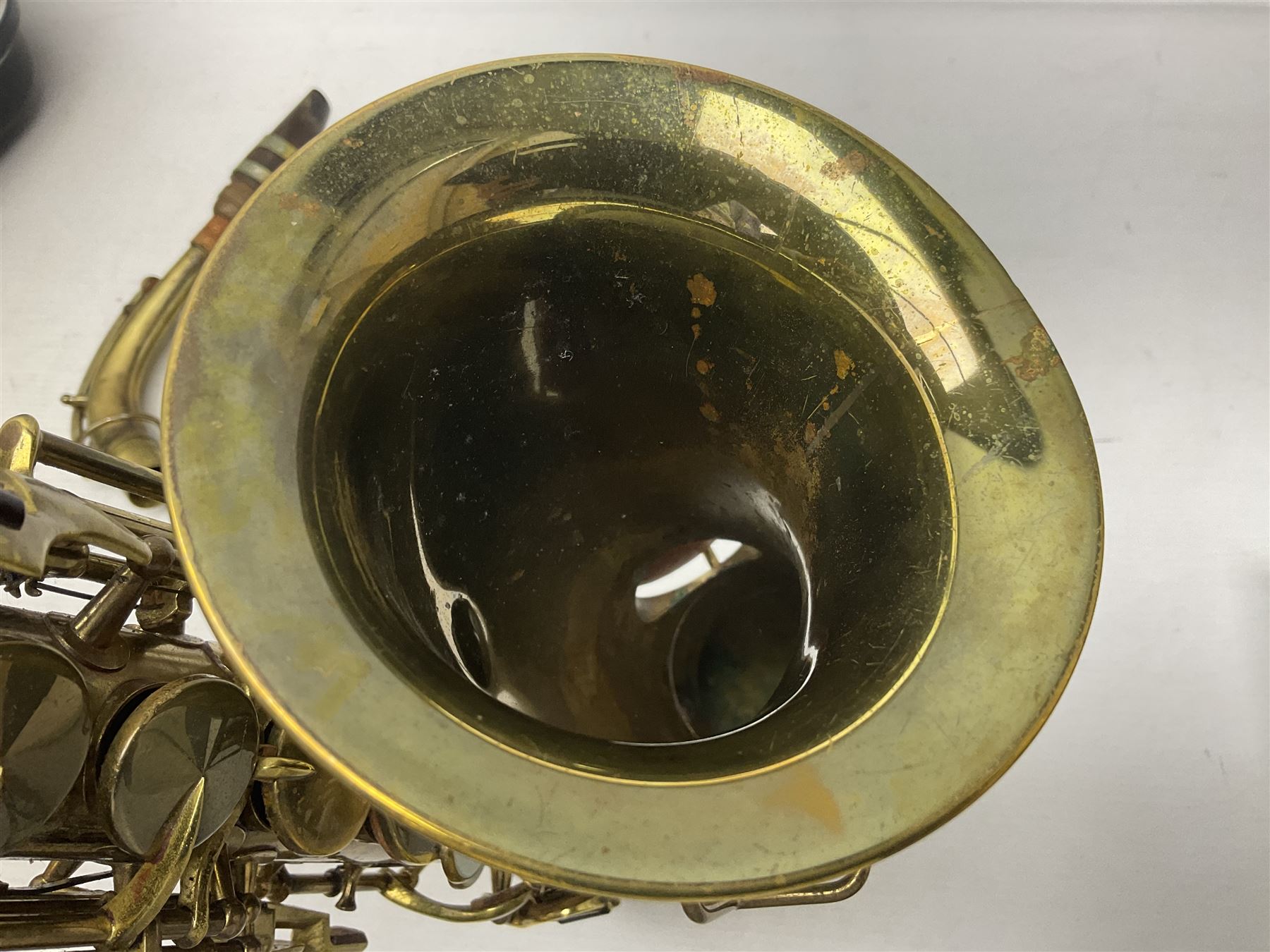 Lacquered brass 'King' alto saxophone inscribed Made by the H.N. White Co.' (Cleveland Ohio) with crook, serial no.84128; also stamped No.1 549 911 and Pat D 8-18-25; in fitted carrying case 