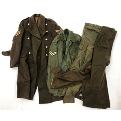  Collection of post-1950 British Army clothing incl. Greatcoat with ACC buttons, inscribed Cpl Mahony ACC, Battledress blouse size 15, WRAC slacks size 3, Denim Overalls blouse and trousers, and Combat Smock   