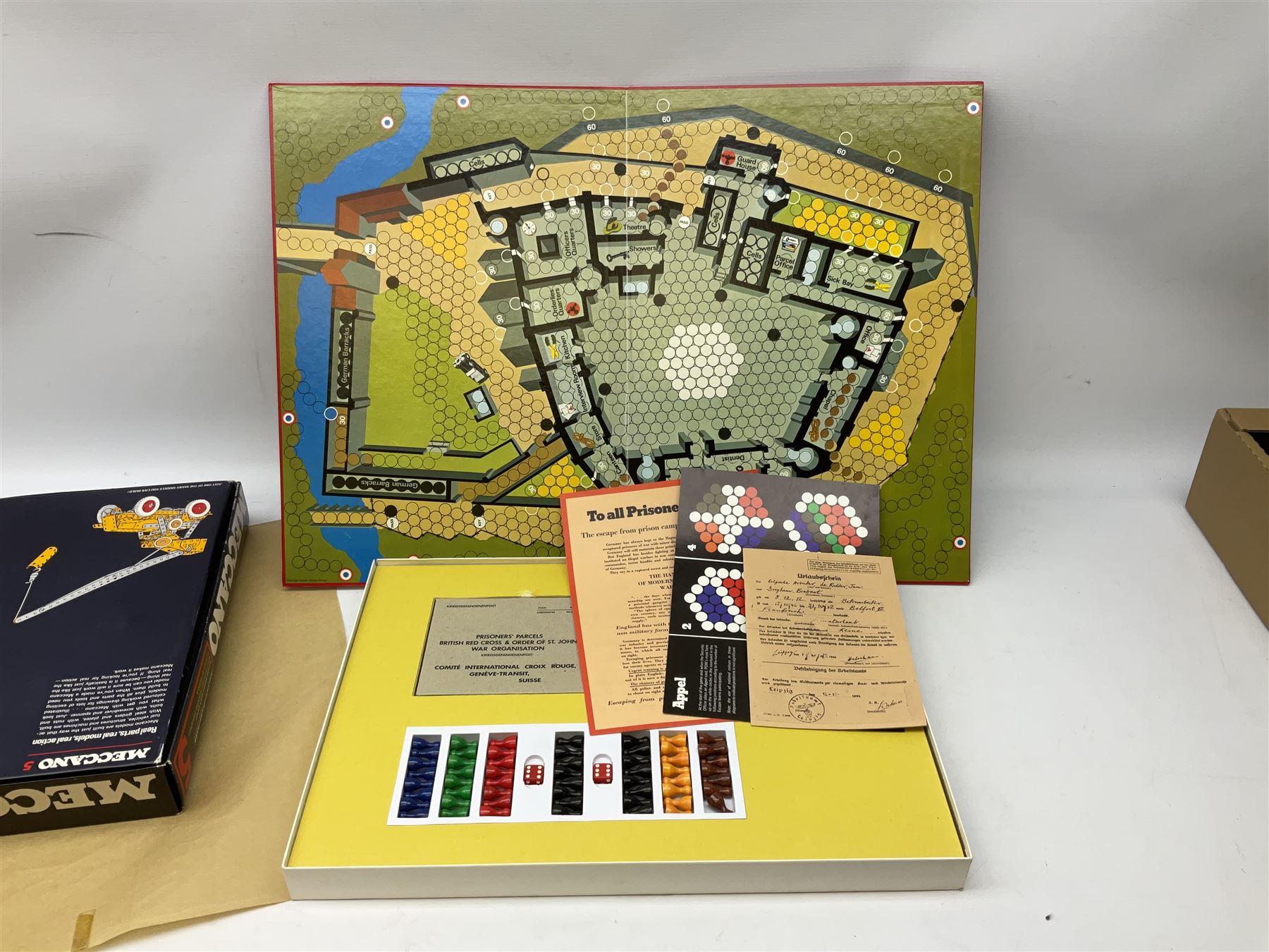 Meccano - Set No.5 with instruction booklets and Set 1+1X Conversion Set; both boxed; Adman Grandstand TV Game; boxed; Parker Colditz Board Game; and four Waddingtons Board Games including Cube Fusion, Totopoly, Golf Winks and Buccaneer; all boxed (8)