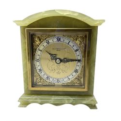 Elliot - English 20th century timepiece mantle clock in a green Onyx case, brass dial with spandrels, pierced steel hands, engraved centre and silvered chapter ring, retailed by Owen  & Robinson Leeds, integral key, wound and set from the rear.