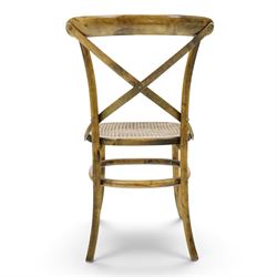 Set of four Oka style rattan dining chairs, bentwood frames inset rattan seat
