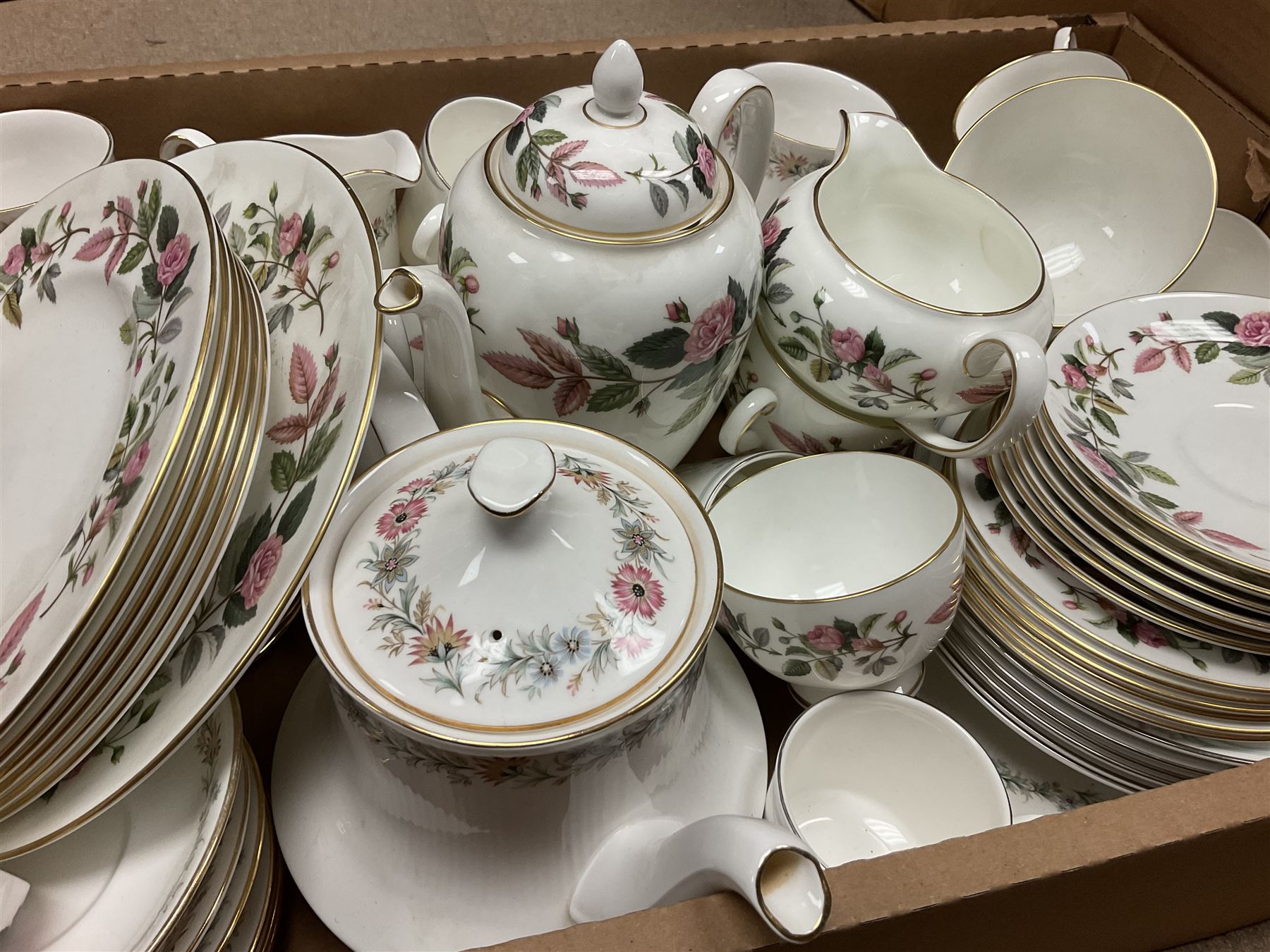 Paragon part dinner service in Belinda pattern, including teapot, six tea cups and saucers, dinner plates etc, together with Royal Doulton part tea service in Carnation pattern, Wedgwood part tea service in Hathaway Rose
