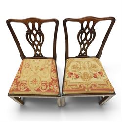 Large 19th century mahogany extending dining table with set of Chippendale design chairs, extending dining table with rectangular moulded top additional three leaves, raised on turned supports terminating in brass castors, the dining chairs (2 + 2) with shaped cresting rail and pierced splats, raised on square supports with stretchers