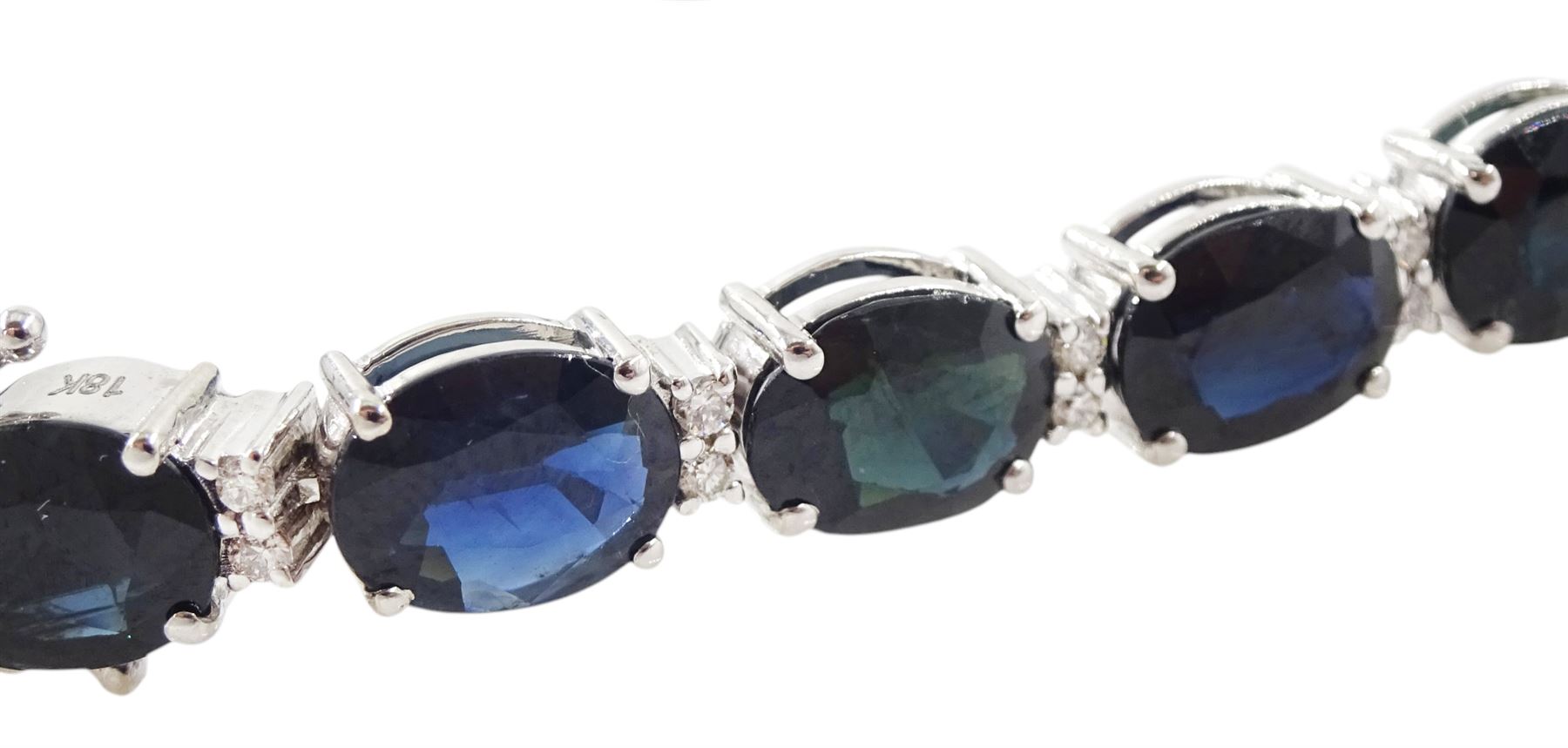 18ct white gold oval cut sapphire and round brilliant cut diamond bracelet, stamped, total sapphire weight approx 29.50 carat, total diamond weight approx 0.45 carat