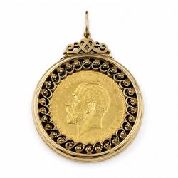 King George V 1912 gold full sovereign coin, loose mounted in a 9ct gold pierced design lo...