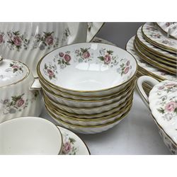 Minton Spring Bouquet pattern dinner and tea service, comprising dinner plates, twin handled tureens with covers, meat platter, teapot, milk jug, sugar bowl with cover, tea cups and saucers, bowls, cake plate, side plates, dessert plates, etc all with printed mark beneath (82)