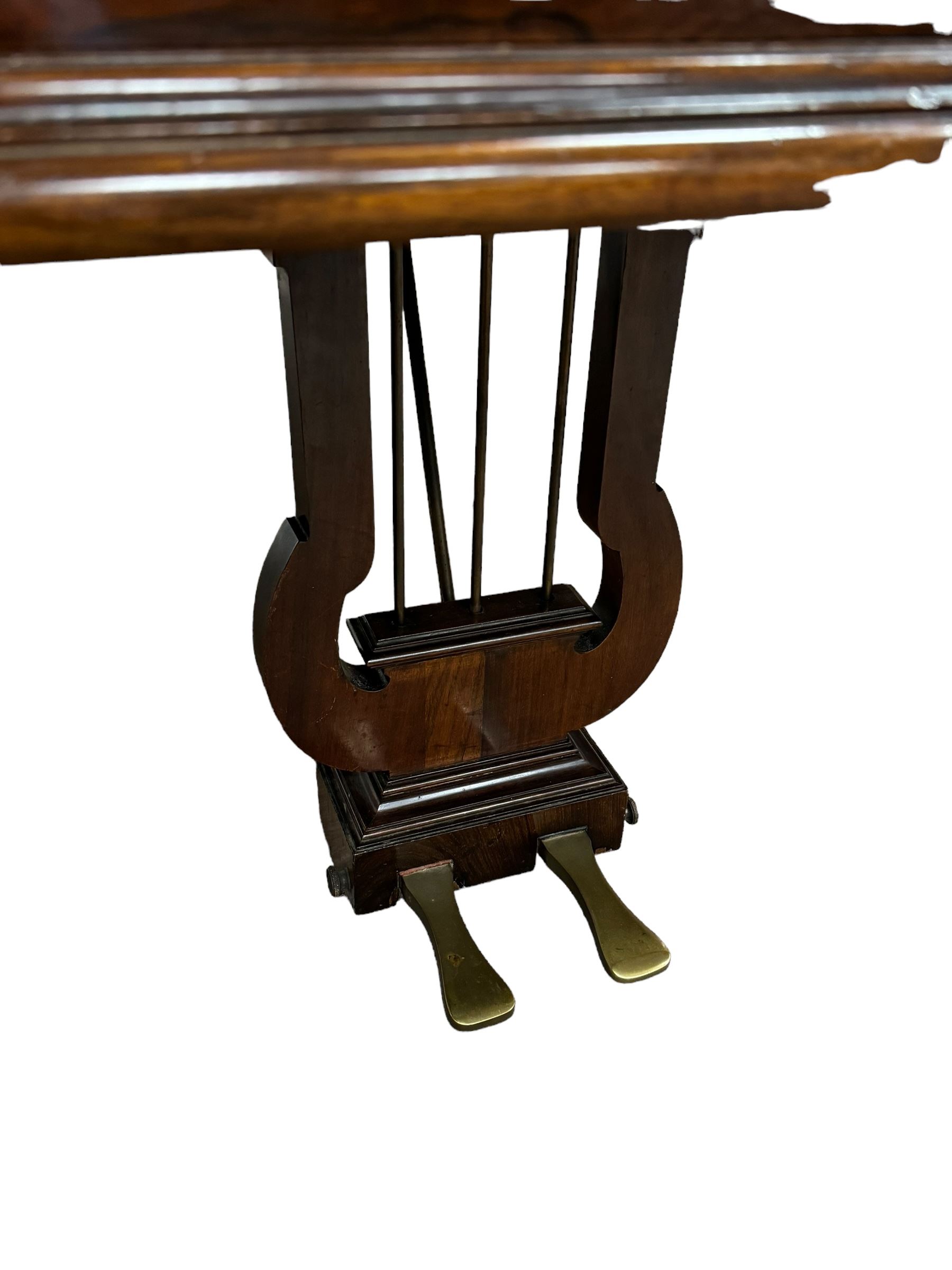 John Broadwood & Sons London - 19th century rosewood grand piano serial  No 47356 (1900-1910) overstrung cast iron frame with 88 notes, 7 octaves, Lyre with sostenuto and una-corda pedals, split-hinged key fall board and fretted music desk, case raised on three taper turned legs with brass castors, original stringing, felt, hammers, dampers and grand roller action.

This item has been registered for sale under Section 10 of the APHA Ivory Act