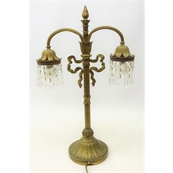  Victorian style gilt brass table lamp, ribbon mounted reeded column, circular base moulded with stiff leaves, leaf shaped terminals with matched cut glass prisms, converted to electric, H56cm   