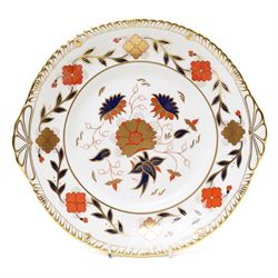 Royal Crown Derby 'Asian Rose' pattern A.962 tea service, comprising tea and coffee pots, open sucrier, milk jug, eight cups and saucers, six side plates, two serving plates, and a boxed Duck with gold stopper