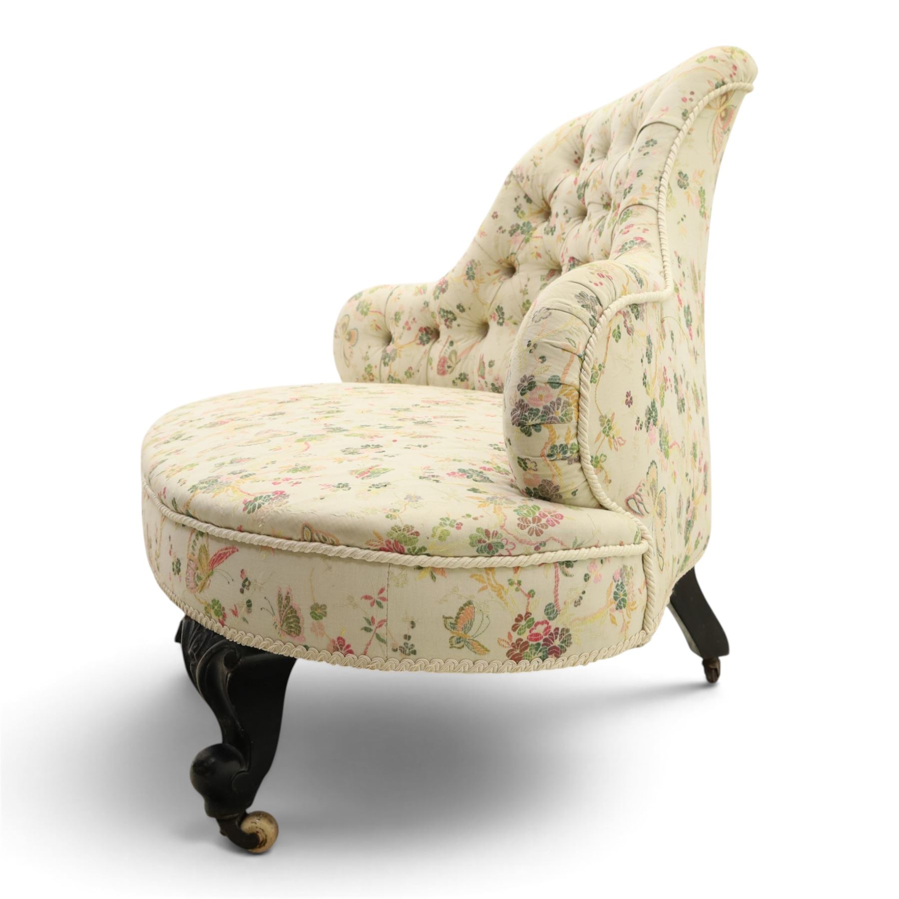Victorian mahogany frame parlour settee, in back-buttoned floral and butterfly patterned fabric