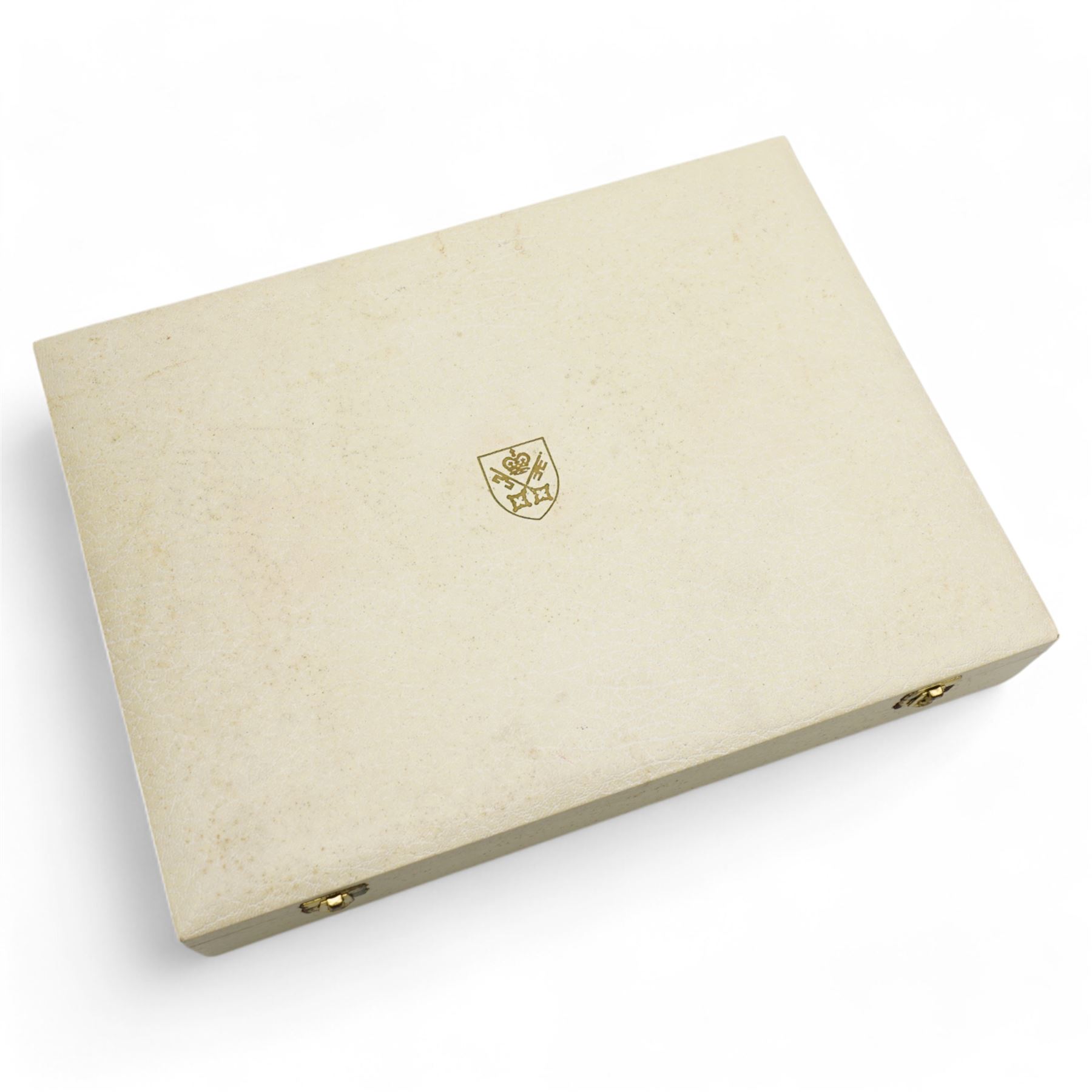 York Minster limited edition silver bowls, commemorating the 500th anniversary of the completion of the Gothic Minster, designed by Hector Miller for Aurum, the gilded handle decorated with stonemasons and blacksmiths working, with planished finish to exterior, no. 326 and 327/1000,  hallmarked Hector Miller, London 1972, D11.5cm, with certificates and original case