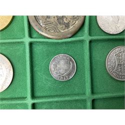 Coins and medallions including, York 1811 one shilling cattle and barber silver token, United States of America 1883O silver Morgan dollar, birds of destiny medal by Malcolm Appleby, Great British King George V 1930 halfcrown, King Edward VII 1902 silver medal, King George V 1916 halfcrown etc, housed in a case with lift out green coin trays