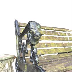 Pair of Victorian Revival Coalbrookdale design 'Dog and Serpent' pattern benches with slatted seats, the cast iron end supports of pierced and scrolling design with dog mask arm terminals