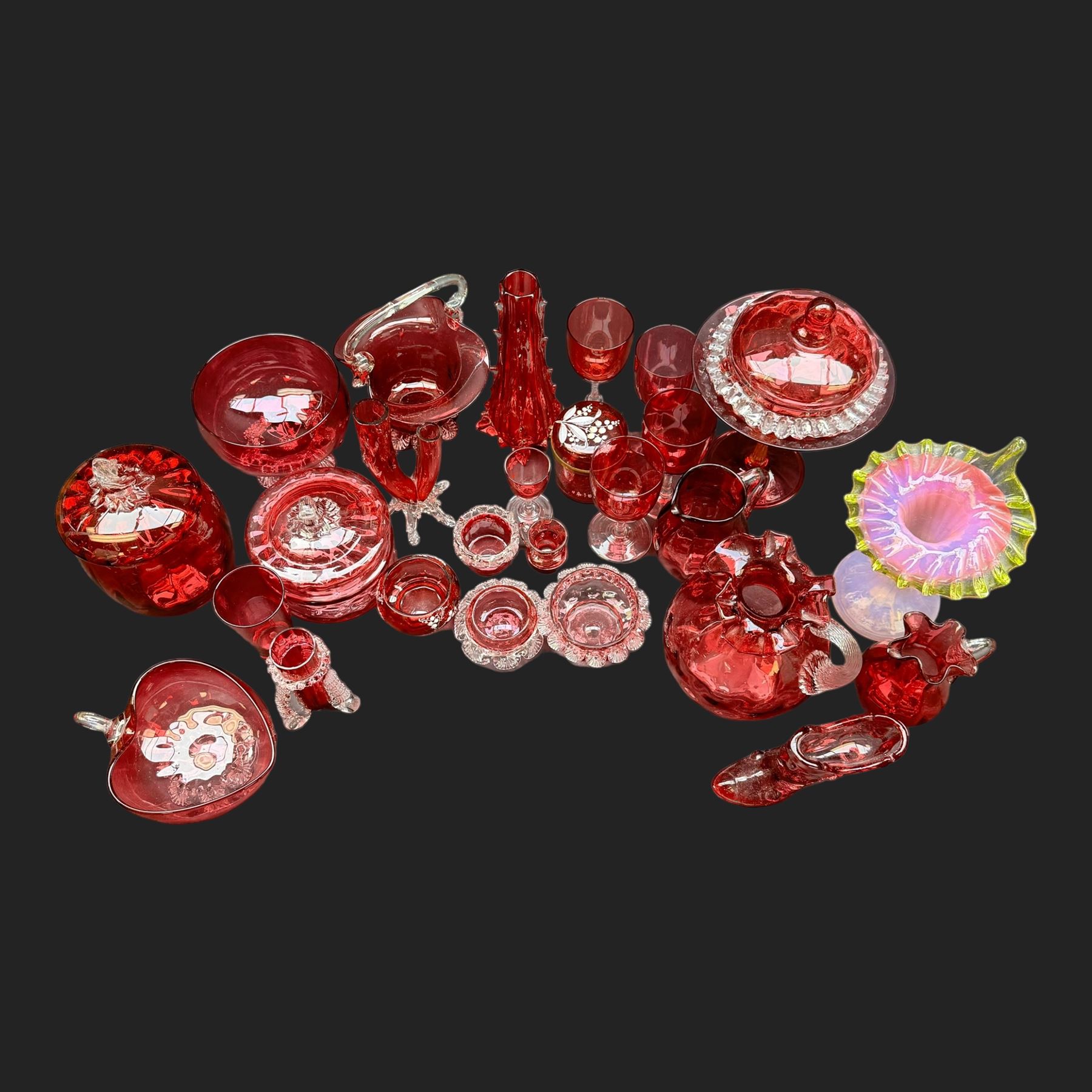 Jack in the Pulpit vase, with a Vaseline rim, together with a collection of cranberry glass, including enameled jars 