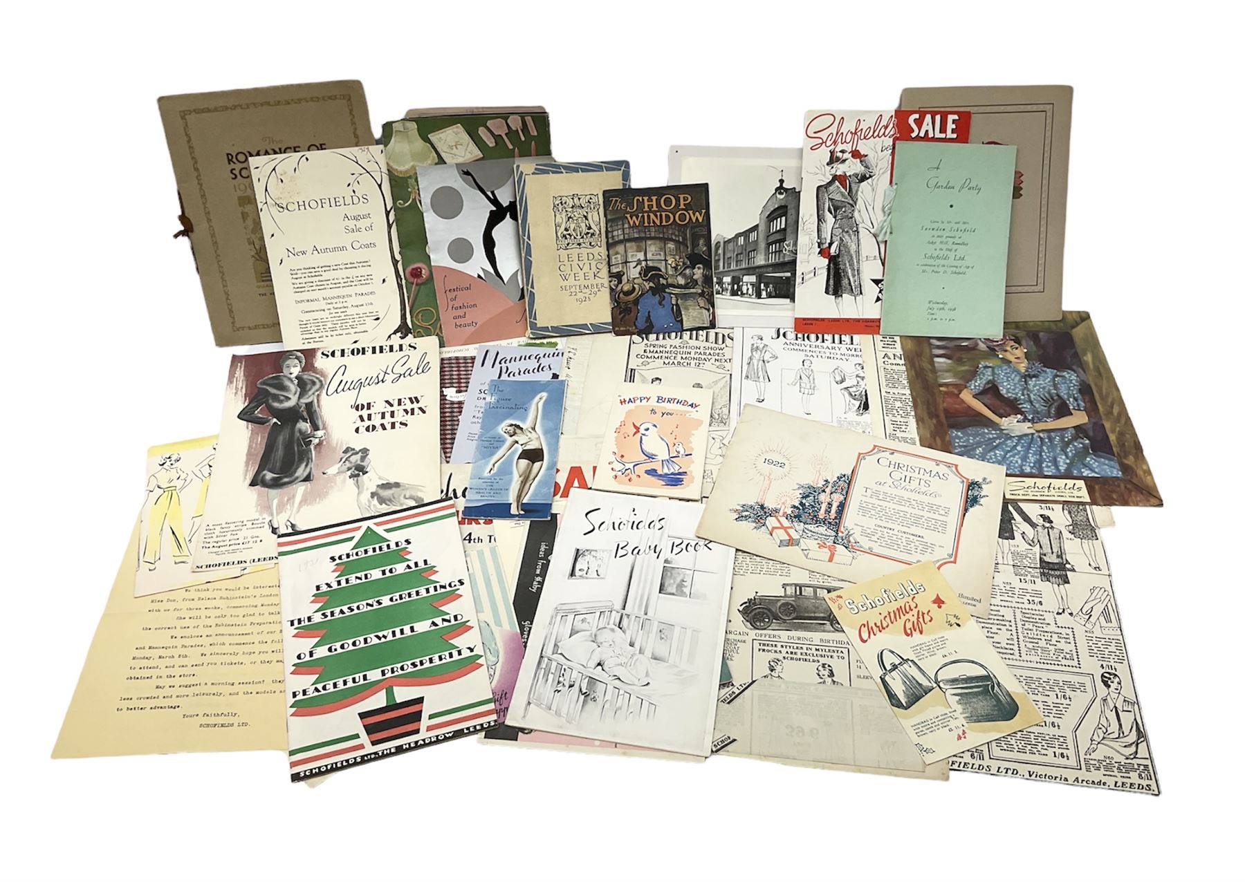 Quantity of paper ephemera relating to Schofields Department Store, The Headrow, Leeds, 1920s - 1950s, including Romance of Schofields 1922, Golden Jubilee Booklet 1951, various catalogues and promotional booklets and leaflets, Christmas offers, greeting cards, marketing and advertising items, menus etc