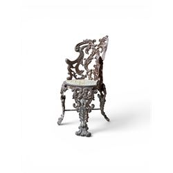 19th century Rococo Revival cast iron garden chair, pierced back comprised of scrolling ac...
