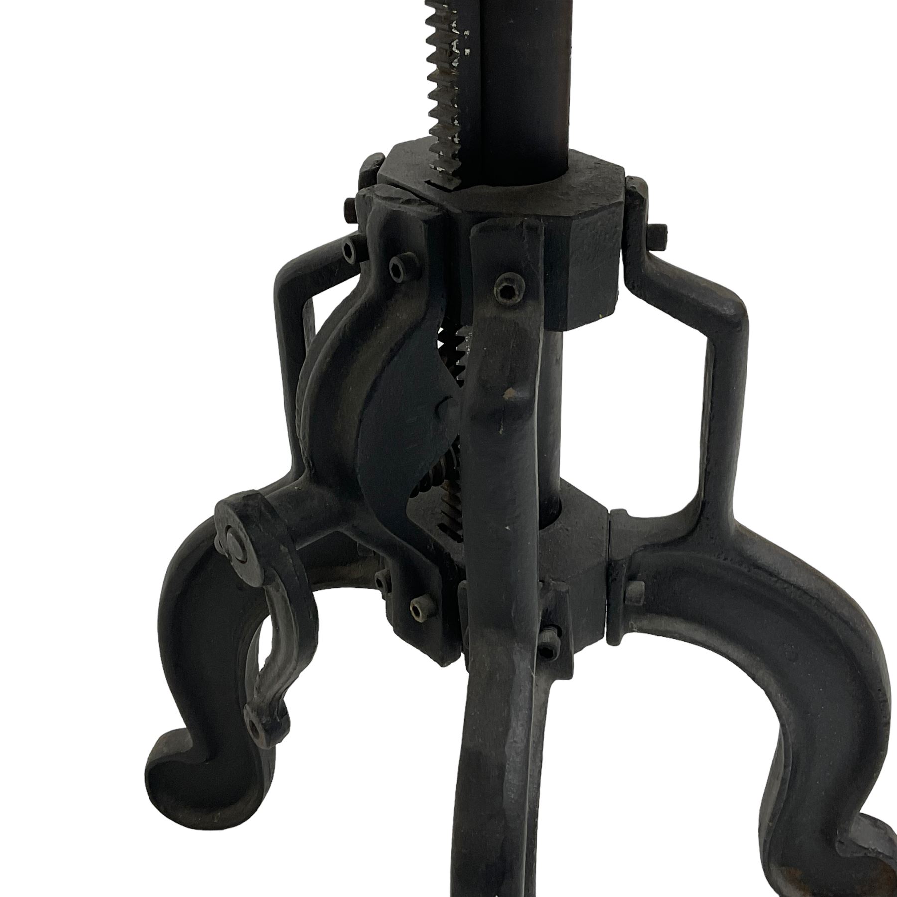 Industrial steel adjustable occasional or bar table, circular top over revolving screw action, raised on four cabriole supports with turning handle to adjust height