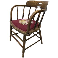 Early 20th century American oak smokers bow tub armchair, shaped cresting rail with pierced handle over ring turned spindle back, seat upholstered in pink tapestry fabric (W56cm, H73cm); small 20th century walnut occasional table on turned supports (W43cm, H70cm, D33cm)