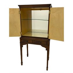 Mid to late 20th century mahogany cocktail cabinet, maple lined interior with mirrored back and glass shelf, fitted with two drawers, square tapering supports with spade feet