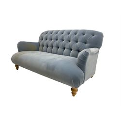Tetrad - two seat sofa upholstered in baby blue buttoned fabric, on turned light beech front feet