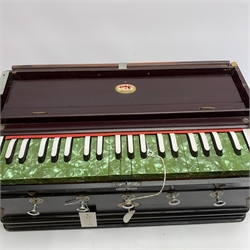 Indian portable harmonium by Kamala with mahogany stained wooden case and green pearline keys L56cm