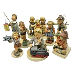 Eight Hummel figures by Goebel, to include special edition marking 100th Anniversary of Aviation no 2173 and no 2133 modelled as three girls with flowers, tallest H17cm