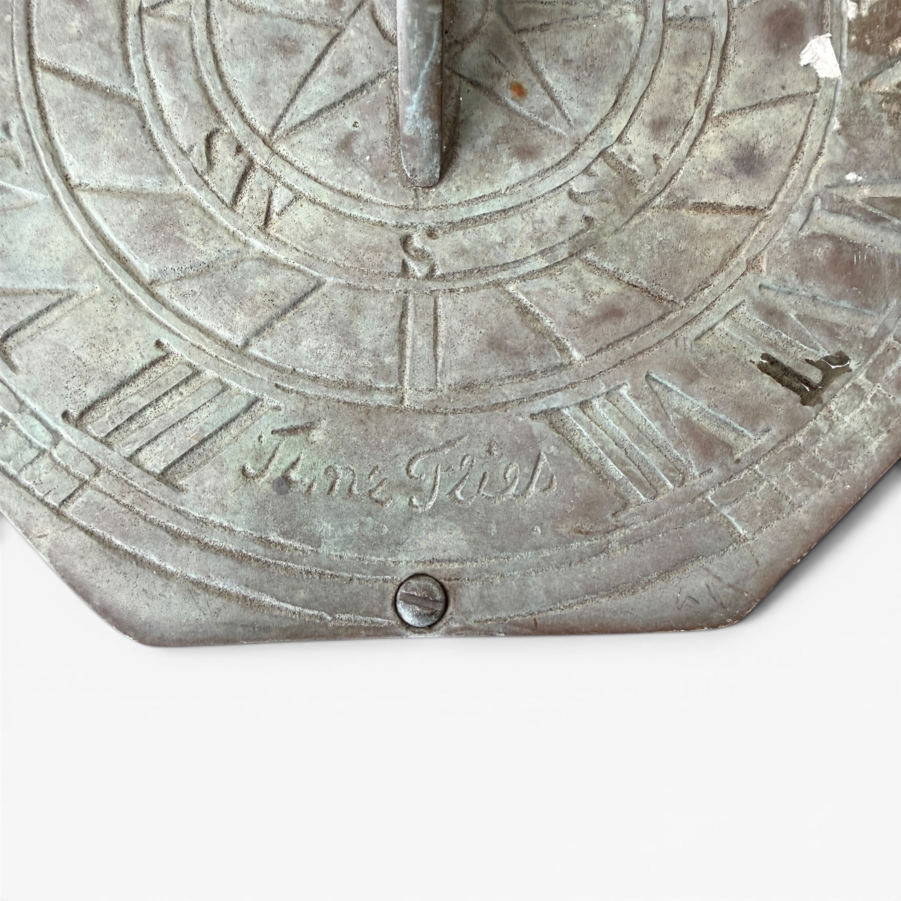 Weathered cast stone sundial, shaped top with metal dial, patterned column