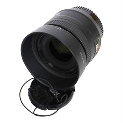 Three DSLR camera lenses, comprising Nikon Nikkor AF-S DX 35mm f/1.8G, boxed, Tokina AT-X Pro 11-16mm F28 Aspherical lens, boxed and Nikon Nikkor AF-S 16-80mm 1:2.8-4E ED lens and a 