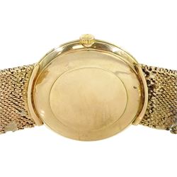 Omega gentleman's 9ct gold manual wind wristwatch, Cal. 601, silvered dial with baton hour markers, London 1969, on integral 9ct gold strap, hallmarked